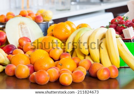 ripe fruits on kitchen table at home
