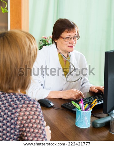 woman visits doctor and receives advice in cabinet
