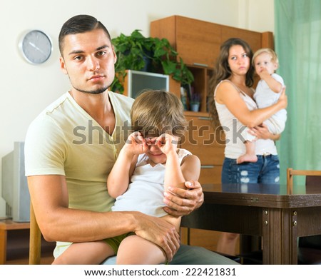 family with two little children  having conflict at home