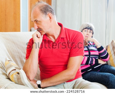 Family conflict. Mature couple after quarrel  at home