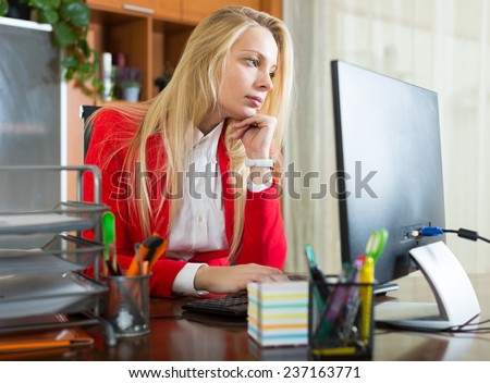 tired blonde woman with smoke office work