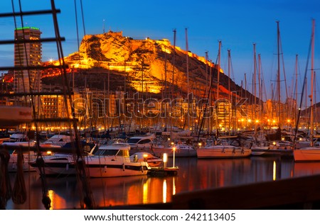 yachts against Castle in night. Alicante, Spain