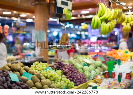 grape and other fruits on european market counter