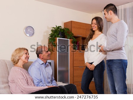parents meeting girlfriend of their son in the everning