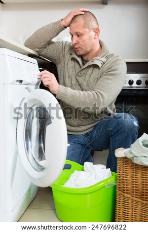 Mature man can\'t figure out how to use washing machine