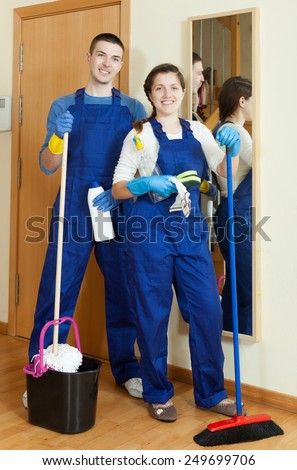 Team of professional cleaners doing chores in your company