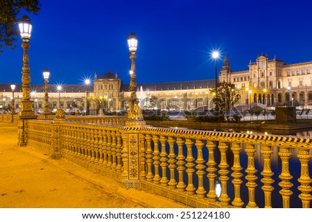 night view of Plaza de Espana through  fence. Seville, Spain