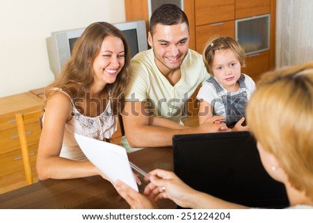 russian parents with daughter glad hearing words of social worker at home russian parents with daughter glad hearing words of social worker at home
