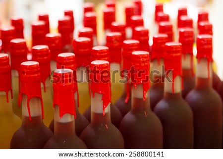 Many wine bottles at shop or winery factory