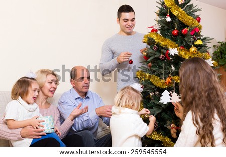 big happy family with decorated Christmas tree