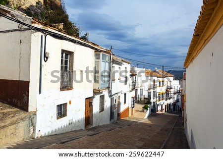 Picturesque narrow street in european city. Olvera is town located in the province of Cadiz, Andalusia, Spain.