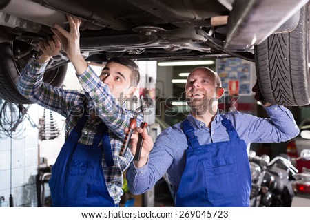 Positive russian mechanics fixing car tire leak