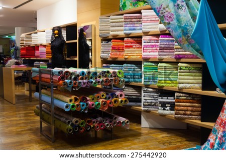 various textiles for sale in fabric shop