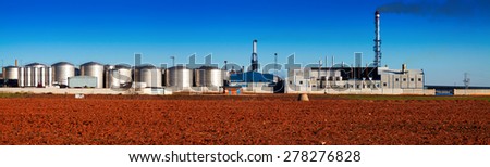 Panorama of industry plant with store buildings at sunny day