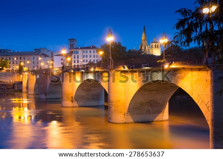 ancient stone bridge over Ebro  in summer night.  Logrono, La Rioja, Spain