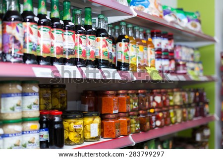 BARCELONA, SPAIN - MARCH 22, 2015: Canned goods at groceries section of average Polish supermarket in Spain.
