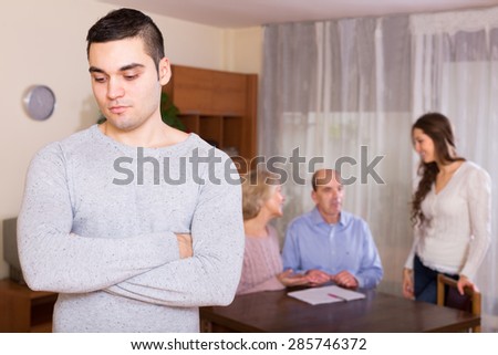 Adult guy with injured look after family quarrel