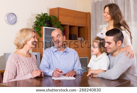 Big family making shopping list together indoor