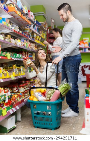 People purchasing a food for week at the supermarket