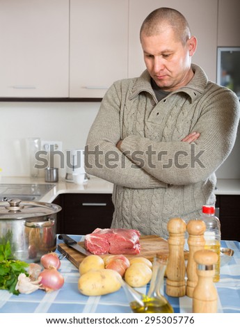 Adult man needs to cook meal for the first time