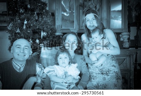 Imitation of ancient photo of Christmas portrait of happy family