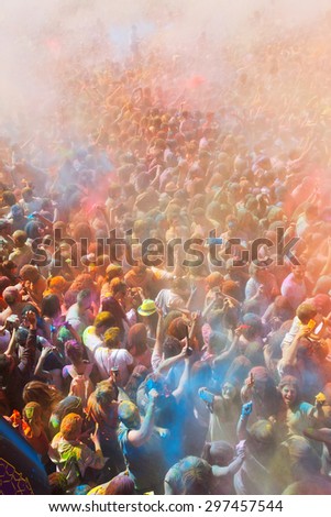 BARCELONA, SPAIN - APRIL 12, 2015: Happy dirty people at Festival of Holi at Barcelona. It is traditional holiday  of Indian culture
