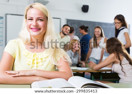 Portrait of young girl paying attention in class during lesson