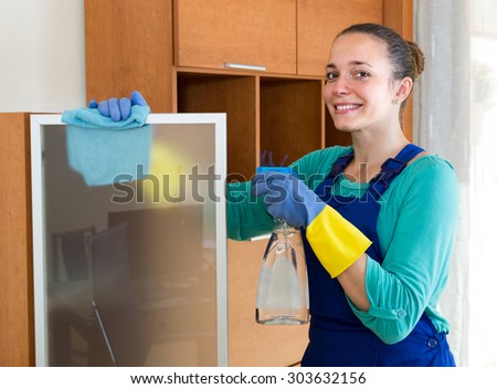 happy professional american cleaner  cleaning the office