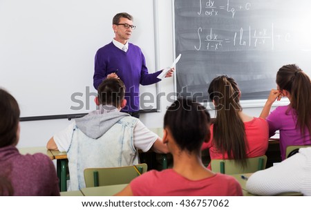 Students listening the explanation of positive teacher in the math course