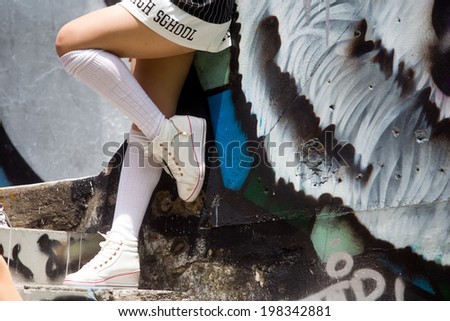 canvas shoes and miniskirt at Graffiti