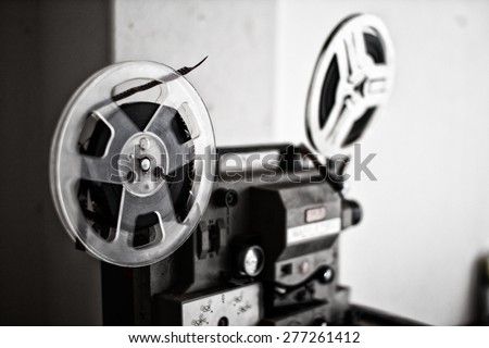 Vintage 8mm Projector Spools in Dark Room