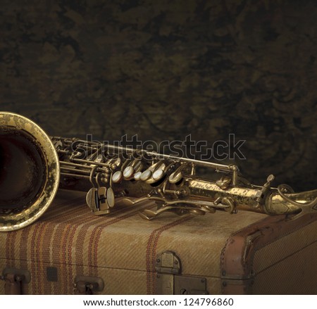 Saxophone and old case