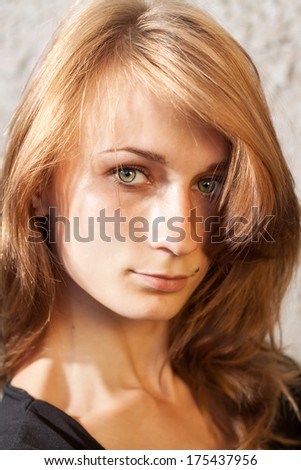 Beautiful young girl with fluffy hair