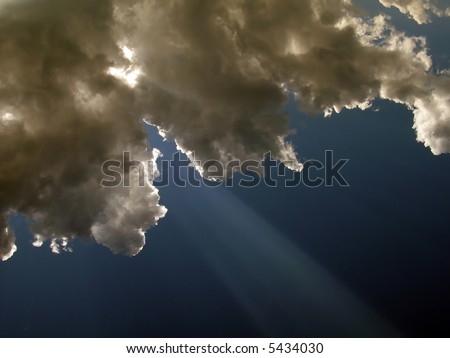 dramatic sky with shaft of light
