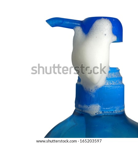 pump bottle with soap foam isolated on white background