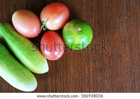Healthy food background /different fruits and vegetables on old wooden table