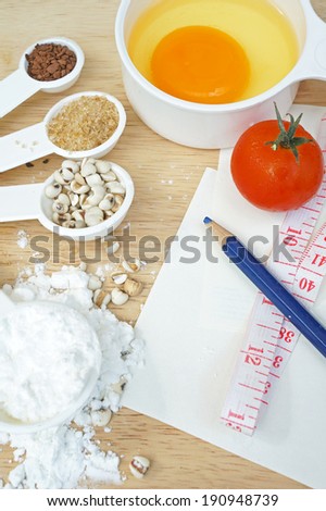 Millet, flour, eggs, sugar, tomato to make a cake