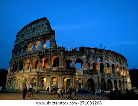 ROME - APRIL 18: Coliseum exterior on April 18, 2015 in Rome, Italy. The Coliseum is one of Rome\'s most popular tourist attractions with over 5 million visitors per year.