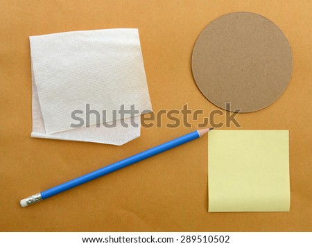 Office supplies, tissue, paper, brown paper, pencil, sticky note