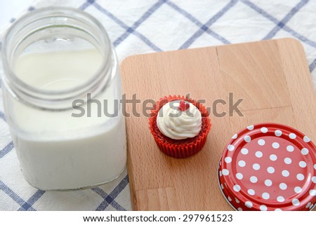 mini cupcake with glass of milk