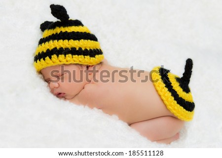 Sleeping baby with bumble crocheted hat and romper