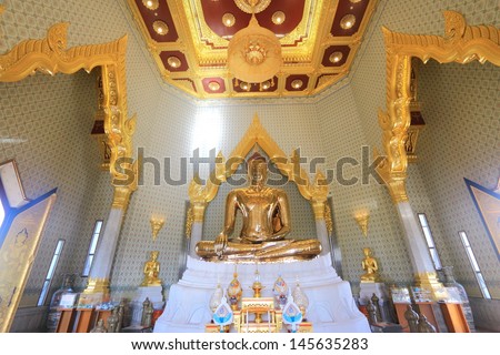 BANGKOK, THAILAND - June 29 :The Gold Buddha in chapel of Wat Trimit Temple, Thailand on June 29,2013 in Bangkok, Thailand. This Buddha Image is made by the gold value 5.5 tons.