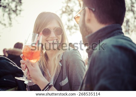 beautiful couple  toasting at cafe