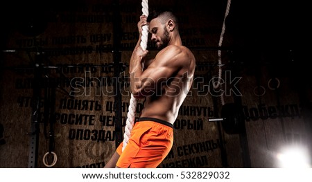 Cross fit athlete with a rope