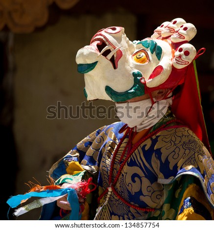 KARSHA, INDIA - JUL 17: unidentified monk performs a religious mask dance during the Cham Dance Festival on Jul 17, 2012 in Karsha, India.