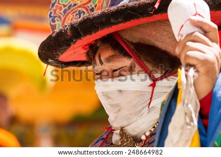 KARSHA, INDIA - JUL 17: The monk performs a religious black hat dance during the Cham Dance Festival on Jul 17, 2012 in Karsha, India.