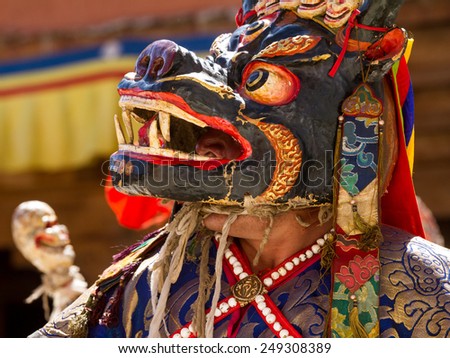 KARSHA, INDIA - JUL 17: unidentified monk performs a religious mask dance during the Cham Dance Festival on Jul 17, 2012 in Karsha, India.