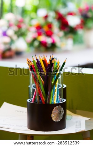 Assortment of colored pencilsColored Drawing PencilsColored drawing pencils in a variety of colors blurred