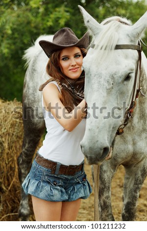 Beautiful cowgirl. Shot in the stable
