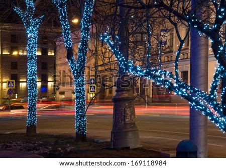luminous garlands on the trees in the streets of old Moscow in winter